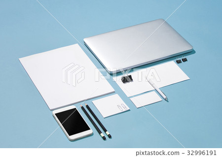 The laptop, pens, phone, note with blank screen on The laptop, pens, phone, note with blank screen on 32996191