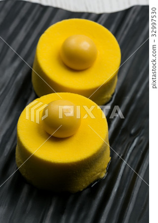 close-up of beautifully decorated delicious yellow close-up of beautifully decorated delicious yellow 32997530