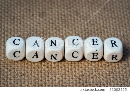 cancer word made from toy cubes with letters 33002835