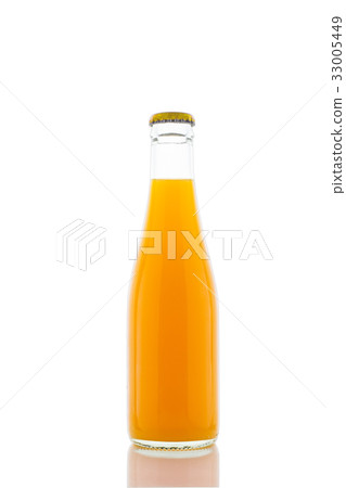 Orange juice in a glass bottle isolated on white Orange juice in a glass bottle isolated on white 33005449