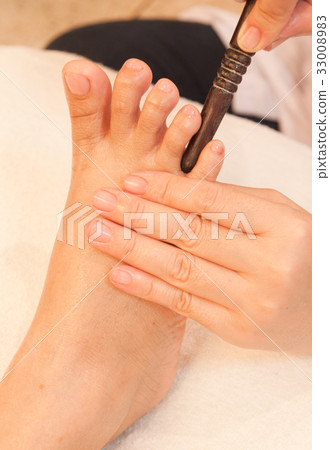 reflexology foot massage by stick wood 33008983