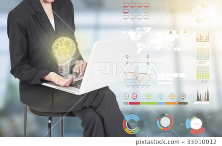 Business women hand holding light bulb. Business women hand holding light bulb. 33010012