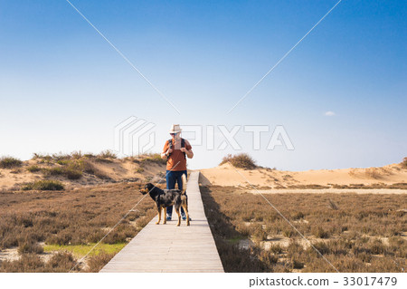 Outdoors lifestyle image of travelling man with 33017479