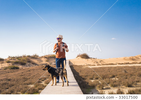 Outdoors lifestyle image of travelling man with 33017500