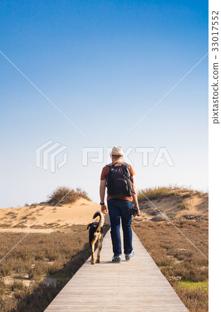 Outdoors lifestyle image of travelling man with 33017552