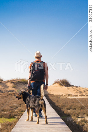 Outdoors lifestyle image of travelling man with 33017553