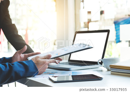 Young business manager working with new startup Young business manager working with new startup 33017935