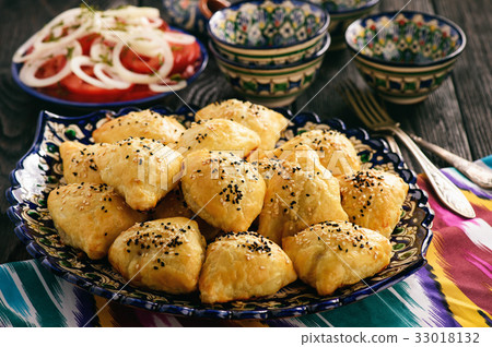 Samosa, samsa - meat stuffed pies, oriental style. 33018132