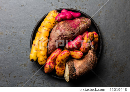 Peruvian raw ingredients for cooking - yuca Peruvian raw ingredients for cooking - yuca 33019448