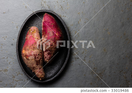 Peruvian raw sweet potatoes camote batata. Top Peruvian raw sweet potatoes camote batata. Top 33019486