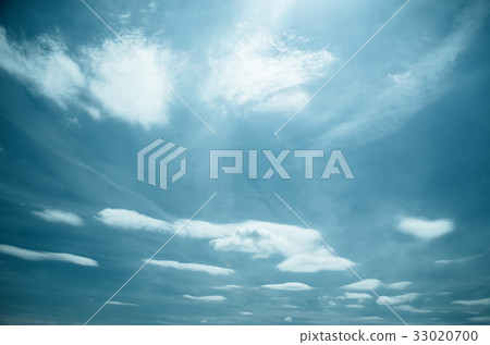 Saturated clouds in the blue sky 33020700