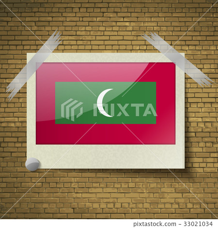 Flags Maldives at frame on a brick background. Vec 33021034