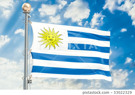 Uruguay flag waving in blue cloudy sky Uruguay flag waving in blue cloudy sky 33022329