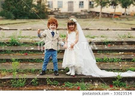 two funny little bride and groom 33023534