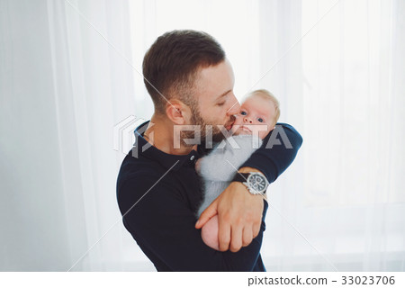 young happy father with cute baby young happy father with cute baby 33023706