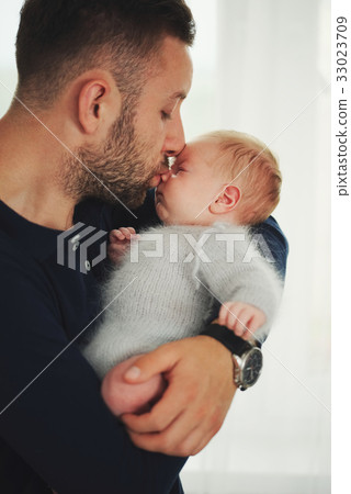 young happy father with cute baby  33023709