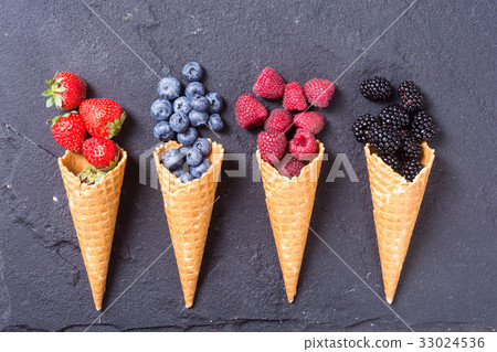 Berries in ice cream cone 33024536