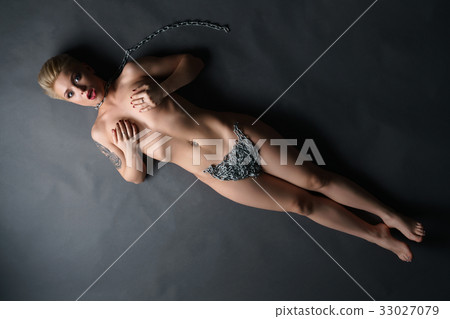Blonde with chain on bikini zone nude portrait Blonde with chain on bikini zone nude portrait 33027079