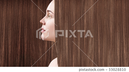 Beautiful woman with luxurious long brown hair. Beautiful woman with luxurious long brown hair. 33028810