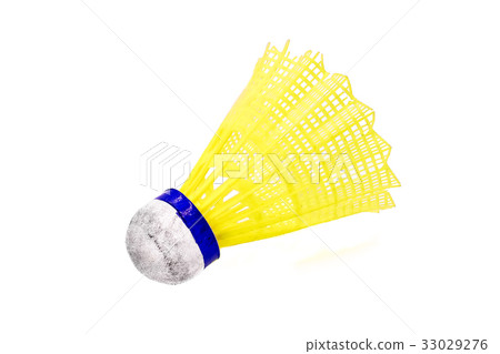 Old yellow shuttlecock on white background 33029276