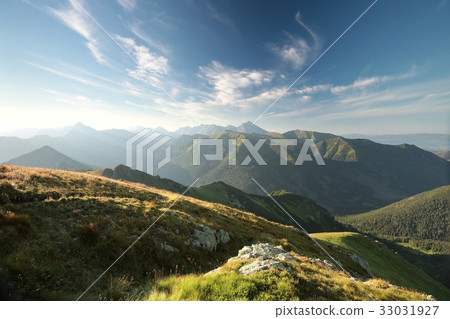 Panorama of the Tatra Mountains at sunrise Panorama of the Tatra Mountains at sunrise 33031927