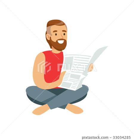 Bearded young man sitting on the floor and reading 33034285