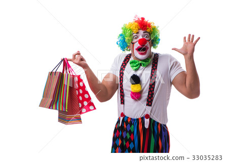 Funny clown with shopping bags isolated on white 33035283