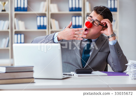Clown businessman tired sleepy in the office 33035672