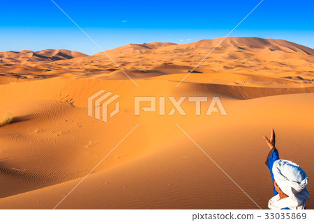 Sand dunes in the Sahara Desert, Merzouga, Morocco Sand dunes in the Sahara Desert, Merzouga, Morocco 33035869