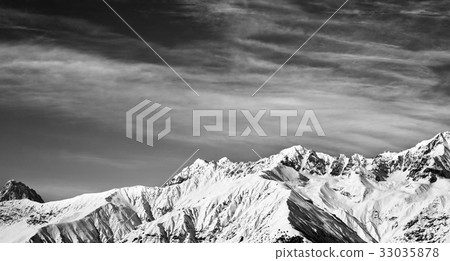 Black and white panoramic view on winter mountains 33035878