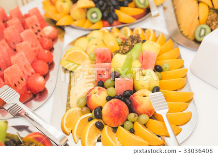 Different fresh fruits on wedding buffet table Different fresh fruits on wedding buffet table 33036408