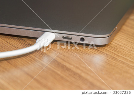 USB type-C on laptop and Cable's White of laptop USB type-C on laptop and Cable's White of laptop 33037226
