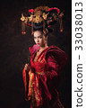 Asian woman in Chinese tradition dress 33038013