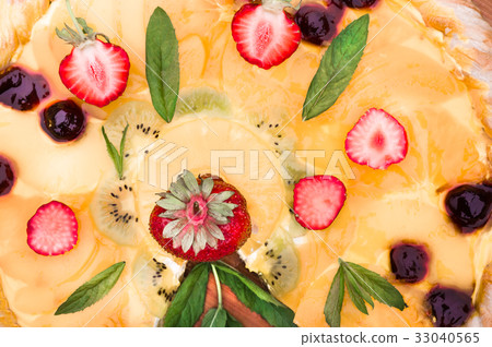 Fruit pizza with strawberries kiwi pineapple 33040565