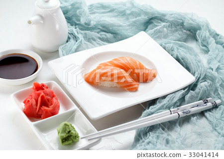 Japanese cuisine. Sushi on a white plate 33041414