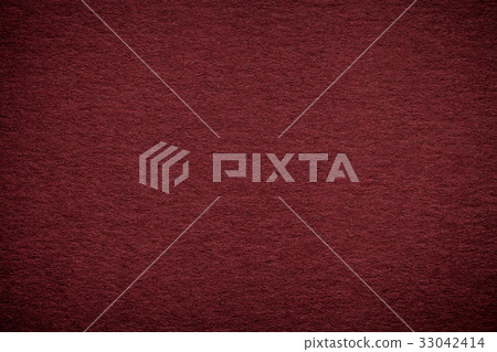 Texture of old dark red paper background, closeup. Texture of old dark red paper background, closeup. 33042414