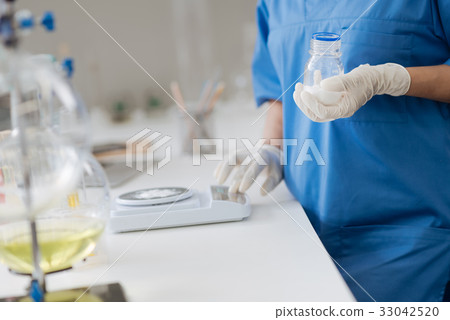 Close up of a bottle with medical powder 33042520