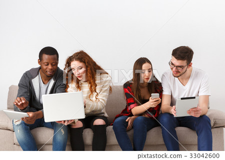 Creative people with gadgets co-working Creative people with gadgets co-working 33042600