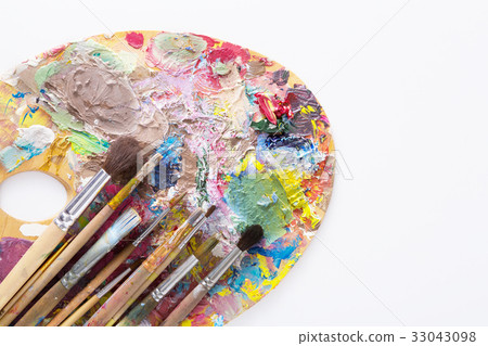 Art palette with colorful paint strokes, isolated Art palette with colorful paint strokes, isolated 33043098