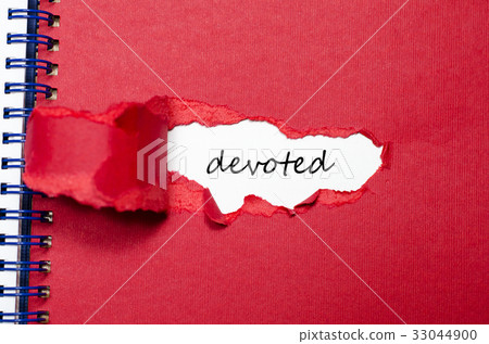 The word devoted appearing behind torn paper The word devoted appearing behind torn paper 33044900