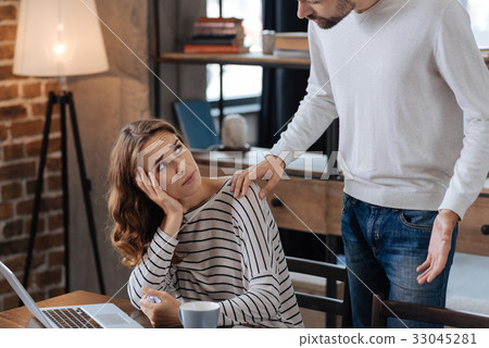 Sad moody woman looking at her boyfriend Sad moody woman looking at her boyfriend 33045281