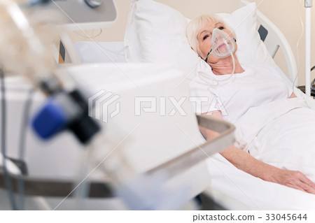 Vulnerable sore woman feeling better after a Vulnerable sore woman feeling better after a 33045644