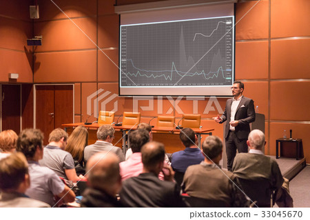 Business speaker giving a talk at business Business speaker giving a talk at business 33045670