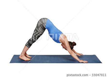 Woman doing Ashtanga Vinyasa yoga asana Adhomukha Woman doing Ashtanga Vinyasa yoga asana Adhomukha 33047811