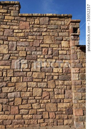 Wall of a building made of stone 33052257