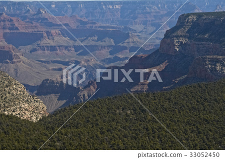 We look at valley which was shaved from green forest platform sky 33052450