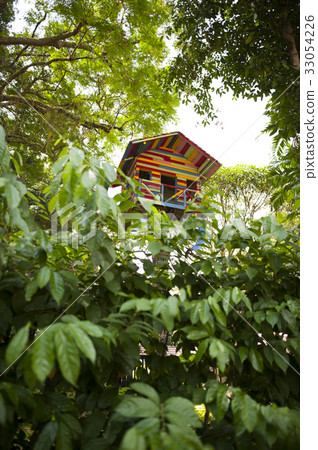 Tree house in a park. Tree house in a park. 33054226