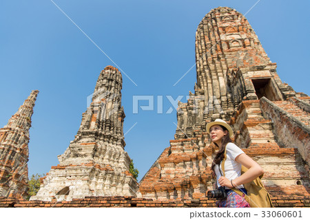 Young girl backpacker relaxing travelling 33060601