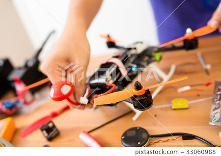 Flying drone making 33060988
