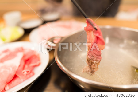 Slice of beef for hot pot in japanese restaurant 33062330